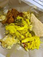 Feasting on the vibrant flavors of Nasi Padang. A delicious journey through every bite photo