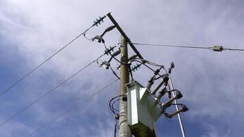 Australia power lines pole with High Voltage Generator, a network of wires and insulators used to connect and transport high voltage electricity from generators , camera view panning from the top. video