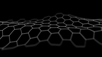 Close-up of wavy hexagonal grid on black background looping animation video