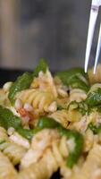 Chef is cooking spaghetti carbonara in the kitchen. Step by step process of making pasta Carbonara with chicken video