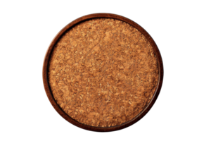 Top view of a circular cork coaster in a wooden frame, isolated on a transparent background. ideal for dining or kitchen decor purposes. png