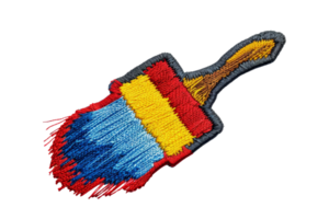 A colorful embroidered patch in the shape of a paintbrush with red, yellow, and blue threads. Ideal for artistic and creative projects. png