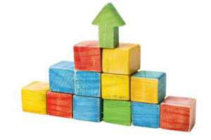 Colorful wooden blocks arranged in a pyramid shape with an upward pointing arrow, symbolizing growth, progress, and development in business or education. png