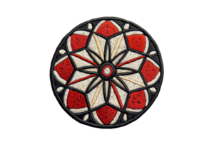 Intricate red and white geometric embroidery design on a circular patch, featuring symmetrical and detailed patterns. png