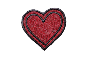 Red heart patch with black outline isolated on transparent background. perfect for DIY projects, clothing embellishment, and Valentine's Day crafts. png