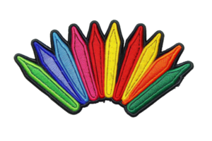Colorful embroidery patch featuring a vibrant arrangement of crayon shapes in a rainbow spectrum, perfect for adding a touch of creativity. png