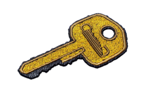 Close-up image of a single golden key isolated on a transparent background. symbolizing access, security, and unlocking potential. png