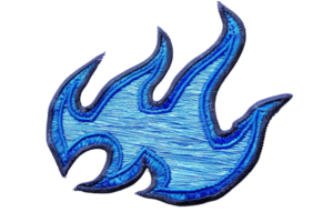 Blue flame embroidery patch on transparent background, perfect for adding a fiery touch to textile and fashion designs. png