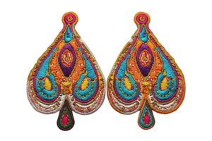 Colorful, intricately designed fabric earrings with vibrant patterns, perfect for adding a pop of color to any outfit. png