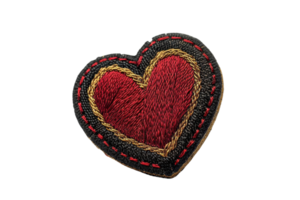 Heart-shaped embroidered patch with intricate stitching. Ideal for clothing decoration, crafting, and personalization. Adds a touch of handmade charm. png