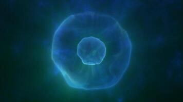 A glowing ethereal green sphere with a soft flowing core floating against a dark mysterious background of energy mysticism, or abstract digital themes video