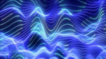 Abstract waves of glowing particles in vibrant blue creating a dynamic and fluid digital landscape against a dark background, video