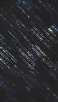 Stylish dark abstract background with glittering textured golden and blue diagonal lines. Vertical animation. video