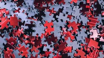 Background of Colored Puzzle Pieces that Slowly Rotating Clockwise - Top View. Texture of Incomplete Red and Grey Jigsaw Puzzle - Right Rotation video