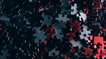 Background of Colored Puzzle Pieces that Slowly Rotating Counterclockwise - Top View. Texture of Incomplete Red and Grey Jigsaw Puzzle with Low Key Light - Left Rotation video