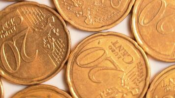 20 Euro Cent Coins, Rotating Money Background - Top View, Macro. Euro Money Currency. A Lot of Twenty Cent Cash. Golden Eurocents. Business, Finances and Money Saving Concept - Slow Rotation Left video