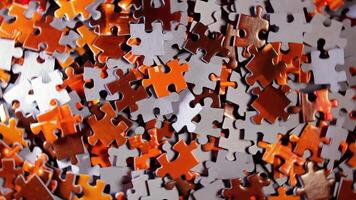 Background of Colored Puzzle Pieces that Rotating Clockwise - Top View. Texture of Incomplete Red and Grey Jigsaw Puzzle - Right Rotation video