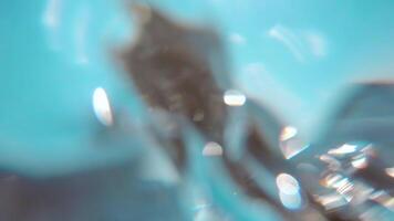 Over and Under Sea Surface with the Lights of the Sun Through the Water. Underwater Split View with Sea Waves at Sunny Summer Day - Slow Motion video
