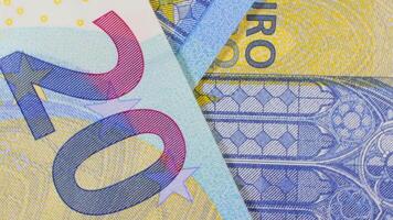 20 Euro Bills, Rotating Money Background - Top View, Macro. Euro Money Currency. Blue Paper Money. A Lot of Twenty Euro Banknotes. Business, Finances and Money Saving Concept - Slow Rotation Left video