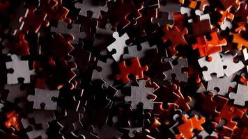 Background of Colored Puzzle Pieces that Rotating Counterclockwise - Top View. Texture of Incomplete Red and Grey Jigsaw Puzzle with Low Key Light - Left Rotation video
