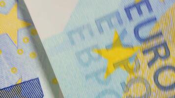 20 Euro Bills, Rotating Money Background - Top View. Euro Money Currency. Blue Paper Money. A Lot of Twenty Euro Banknotes. Business, Finances, Cash and Money Saving Concept - Angular Rotation video