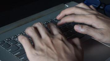 Close up man working with this laptop and get motivation sticky note with word Sorry video