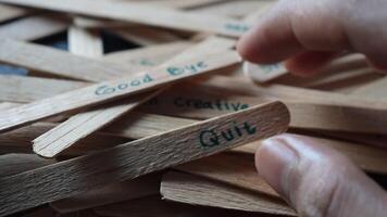 Hand hold Stick with word I am Creative. Finding Motivation in the middle of ice cream sticks video