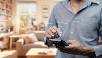 A man holding a smart phone with a virtual brain on it photo