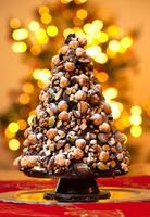 A christmas tree made of nuts and chocolate photo