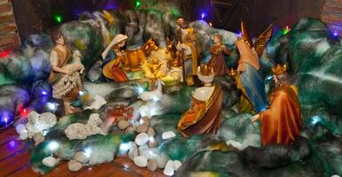 A nativity scene with christmas lights on it photo