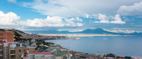 A view of the city and the sea from a hill photo