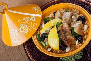 A bowl of food with a lid on it photo