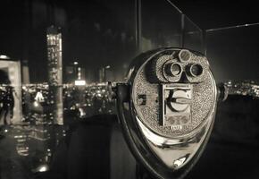 A black and white photo of a coin