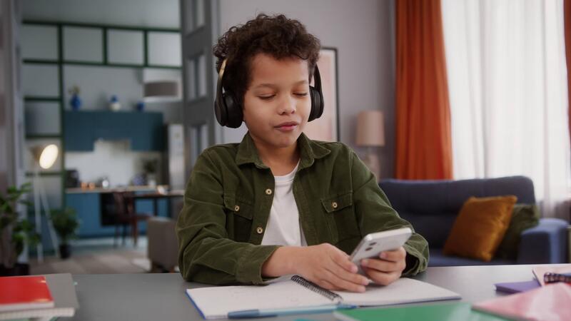 Funny little African American boy son kid child break of studying 