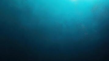Mysterious underwater scene with blue hues and soft textures, creating a calming atmosphere. photo