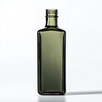 Green glass bottle with a square shape on a white isolated background. photo