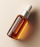 A stylish dropper bottle with amber oil against a soft beige background. photo