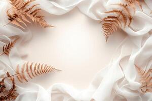 Delicate fern leaves arranged on soft white fabric for a serene and natural background. photo