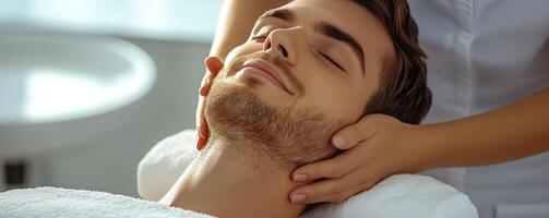 Relaxing male spa treatment, close-up of a man enjoying a massage, serene atmosphere, soft lighting. photo