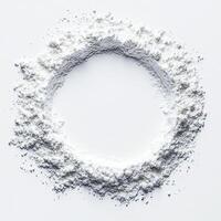 White powdered substance arranged in a circular shape on a clean background. photo