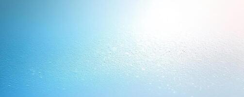 Abstract blue gradient texture with soft highlights on a light background. photo