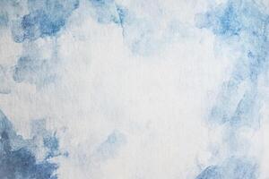 Light blue watercolor texture on white background for artistic use. photo