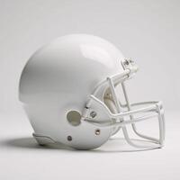 White football helmet is shown against a white background to emphasize its role as safety equipment in American Football gear and sports photography photo