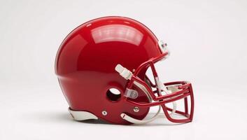 Red American football helmet against plain white backdrop photo