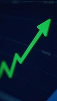 A dynamic stock market graph shows financial growth and investment success depicted as a green upward line against a dark blue background photo