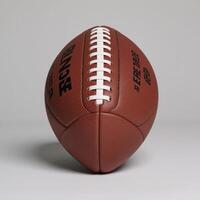 A striped American football featuring laced top edge photo