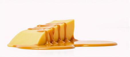 Isolated melted cheese droplet with sauce swirling on top of a cheese slice photo