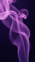 Slowmotion image showcasing realistic purple mist or fog subtly rising and dispersing in an atmospheric setting photo
