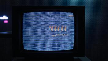 Glitched TV screen showcases pixelated background and distorted error broadcast complete with widespeed rewind effects photo