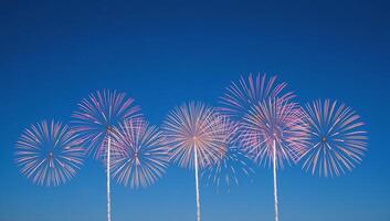 Stunning daytime firework show with vibrant hues set against a clear blue sky Copy Space Image photo